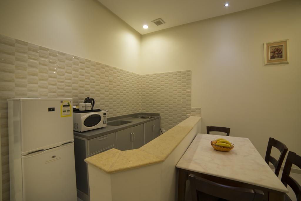 Kyan Al Yarmouk Suites Riad Exterior foto